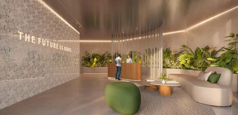Lobby do First Humaitá com jardim interno, recepção e lounge